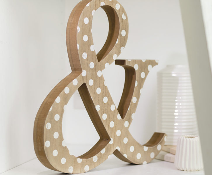 Home decor item with polka dot pattern transfer on wooden ampersand